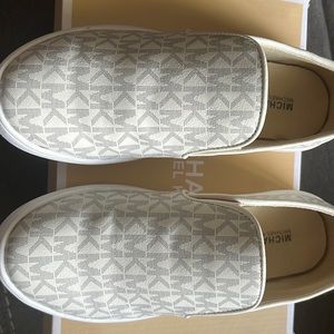 Michael Kors slip on sneakers girls size 3. Worn for about 30 mins indoors.